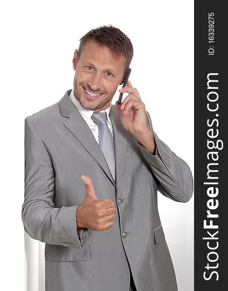 Smiling Businessman With Thumb Up