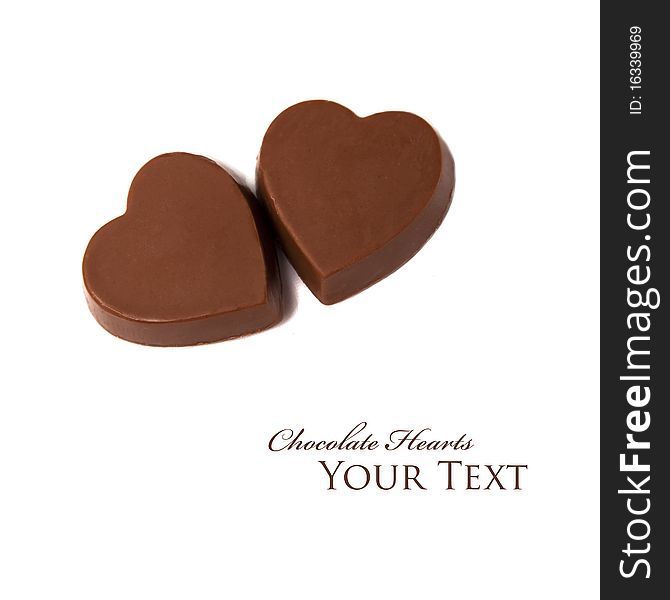 Heart chocolates isolated on white