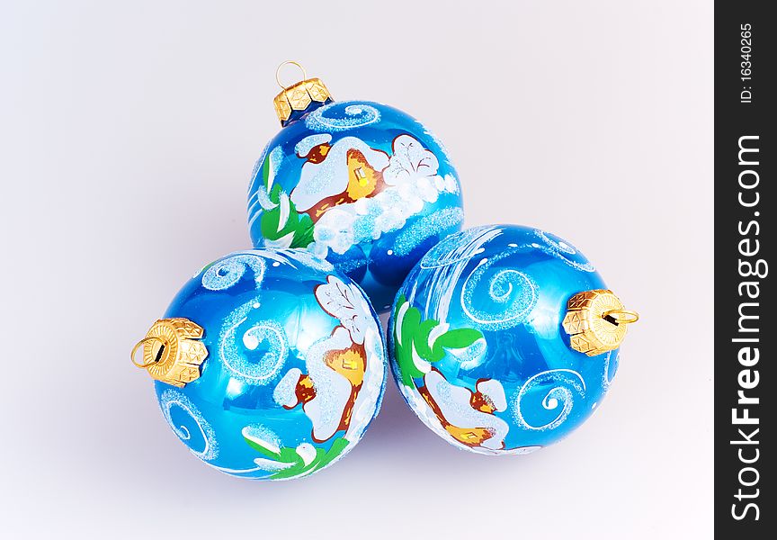 Christmas blue spheres on the white background