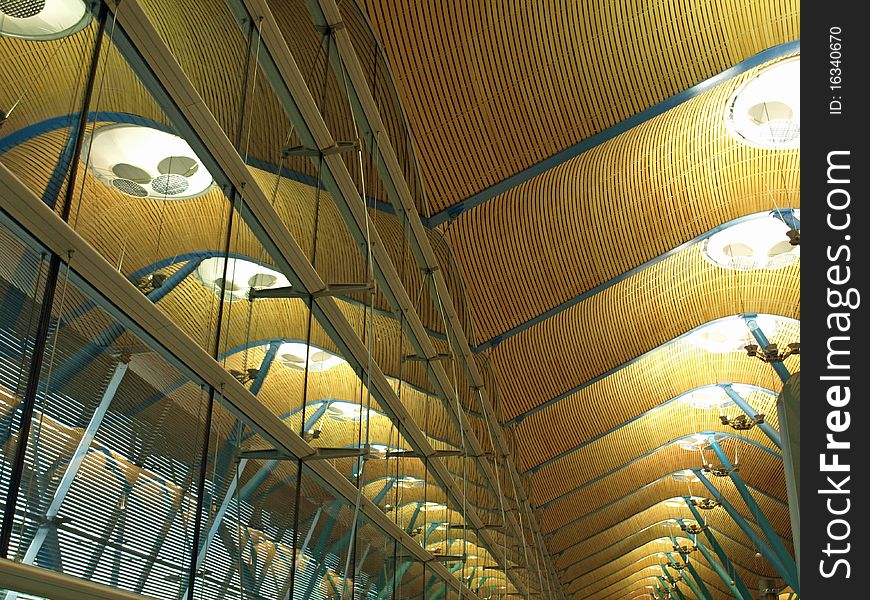 Terminal in the madrid airport with interesting architecture of the ceiling. Terminal in the madrid airport with interesting architecture of the ceiling