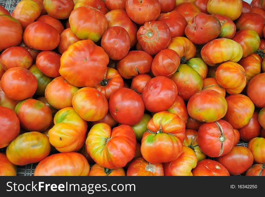 Natural texture with organic red tomatoes