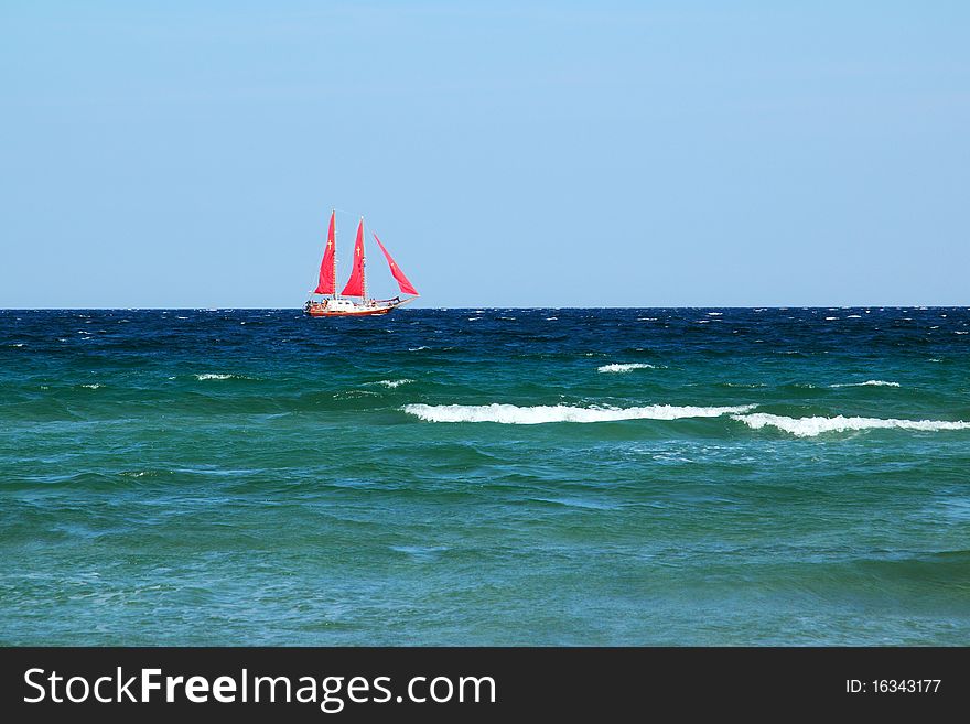 Boat with the red sails. Boat with the red sails