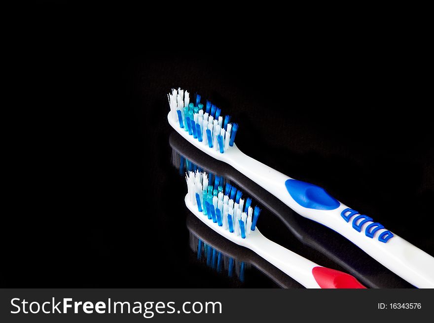 Tooth brush on black background