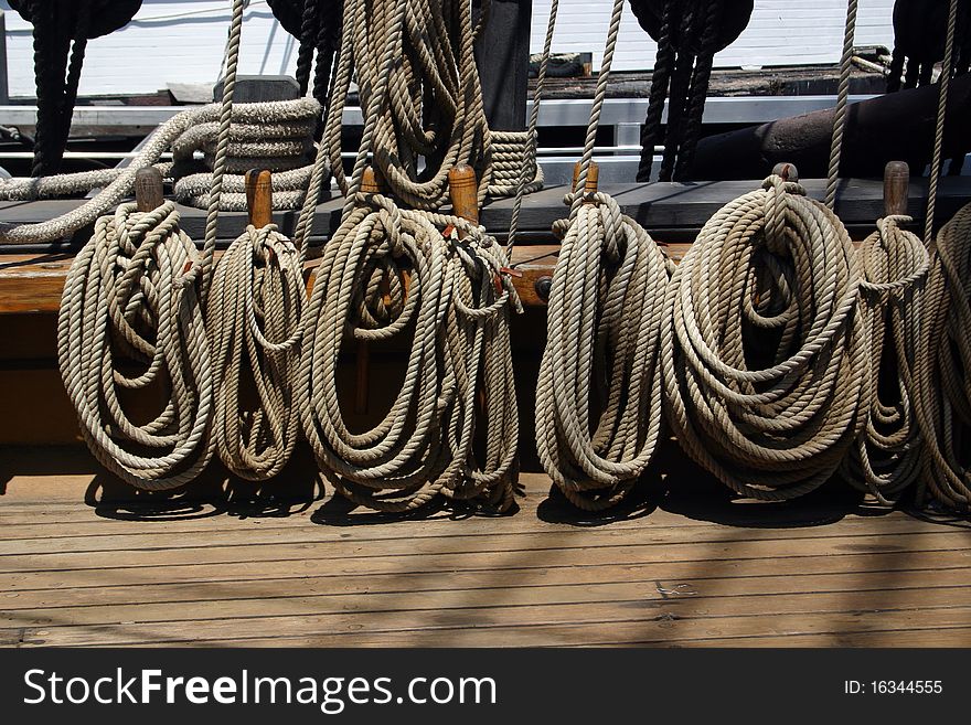 The rope riggings on an old schooner or sailing ship. The rope riggings on an old schooner or sailing ship
