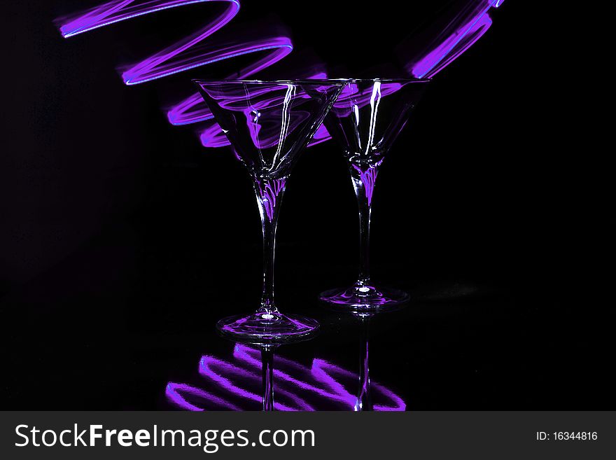 Pair Martini Glasses With Purple Light Trails