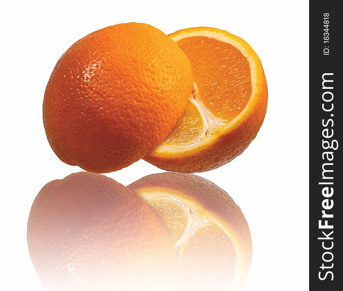 Single orange on a white isolated background using macro lens. Single orange on a white isolated background using macro lens
