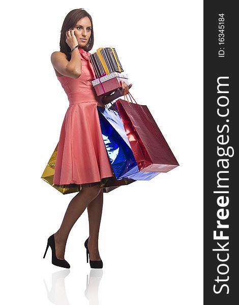 Pretty young woman with bags of purchases. Pretty young woman with bags of purchases