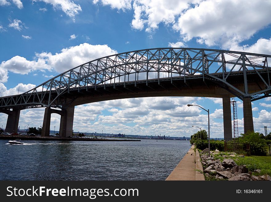 Long iron bridge over a river