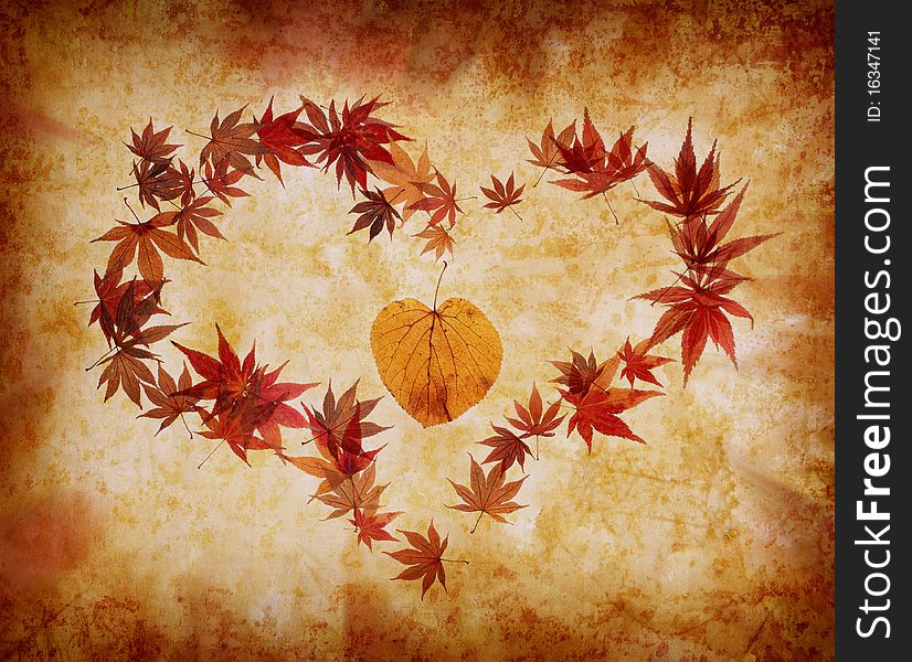 Grunge background with heart shape made by leaves