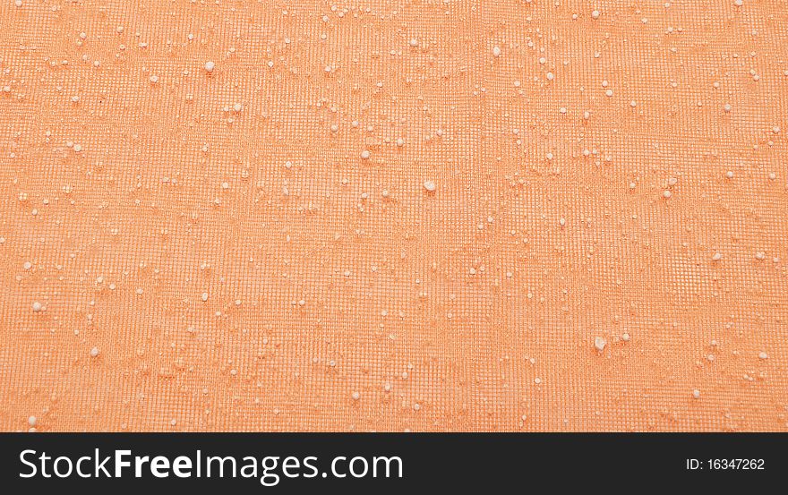 Close orange grid with white dots for background