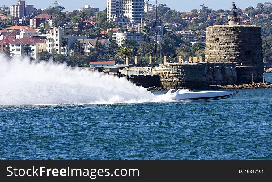 Powerboats racing near Fort Denison in Sydney Harbour
