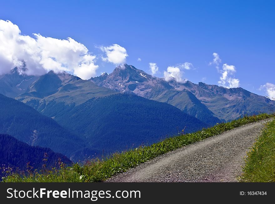 Country path in mountains, Wiesen, Swiss Alps. Country path in mountains, Wiesen, Swiss Alps