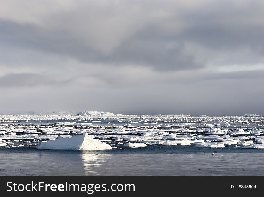 Arctic winter landscape - frozen fjord and glacier. Arctic winter landscape - frozen fjord and glacier