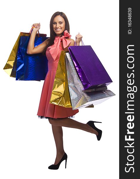 Pretty young woman with bags of purchases. Pretty young woman with bags of purchases