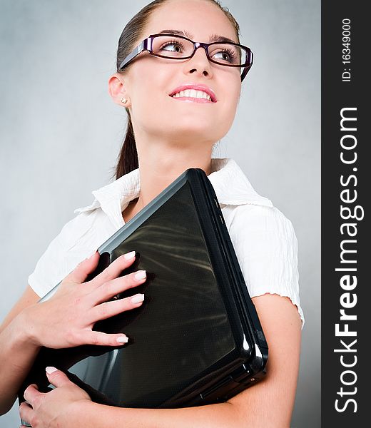 Young businesswoman with laptop