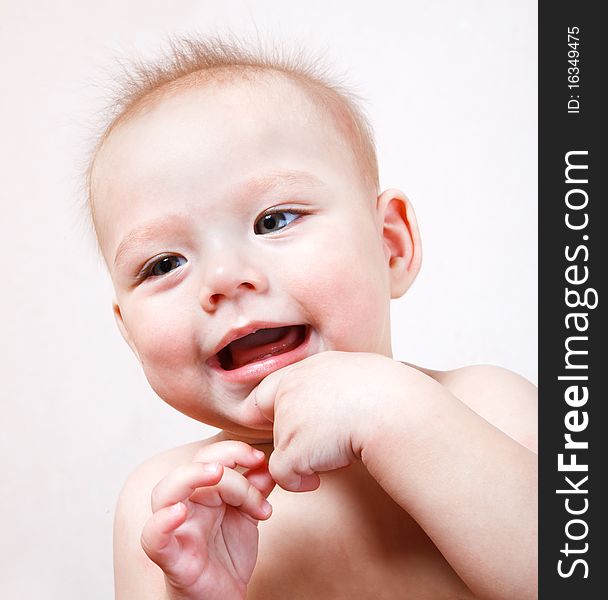 Portrait of a laughing baby boy