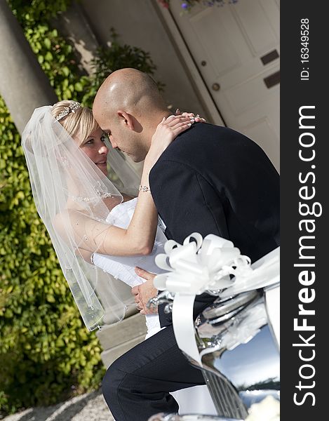 Intimate moment captured between a beautiful bride and groom