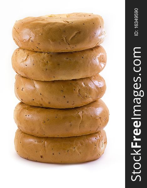 Stack Of Bagels Over White