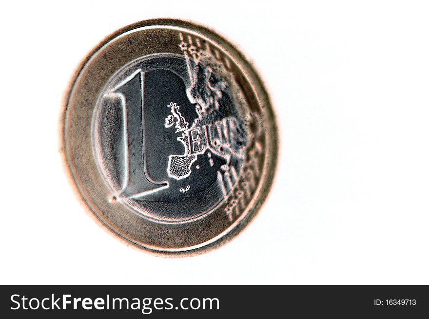 A one euro coin close-up isolated.