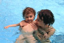 Mom With Baby In The Pool Stock Image