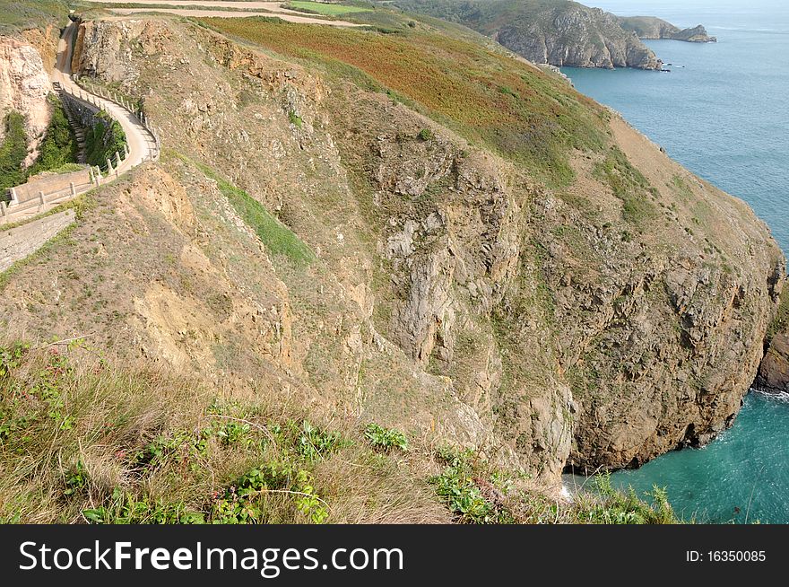 La Coupee causeway on Sark in the Channel Islands. La Coupee causeway on Sark in the Channel Islands