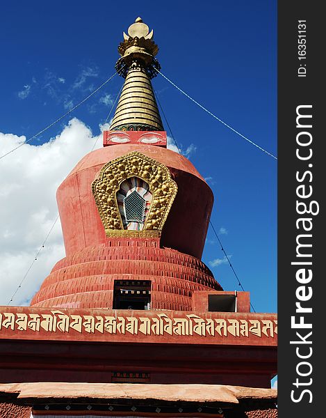 Scenery of a red buddhist stupa in Tibet,with blue skies as backgrounds. Scenery of a red buddhist stupa in Tibet,with blue skies as backgrounds.