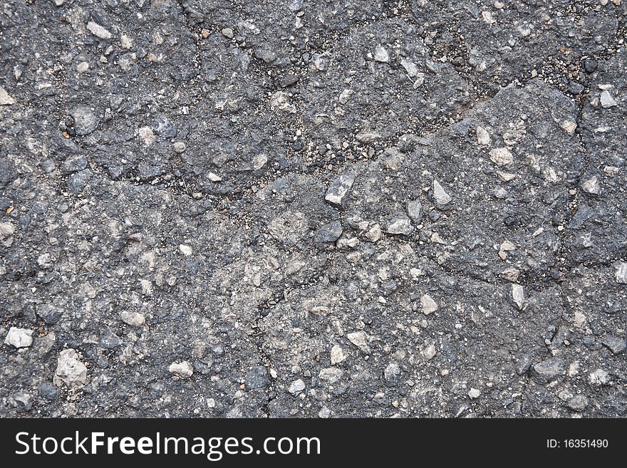 Surface of the old cracked asphalt. Surface of the old cracked asphalt