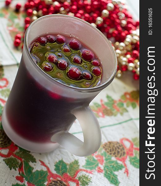 Hot drink with cranberries and cinnamon. Hot drink with cranberries and cinnamon
