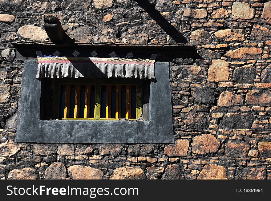 Tibetan window in the wall
