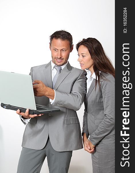 Business partners standing on white background. Business partners standing on white background