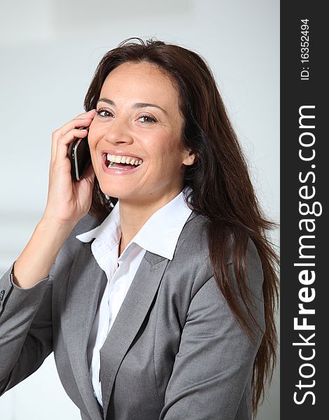 Smiling Businesswoman On The Phone