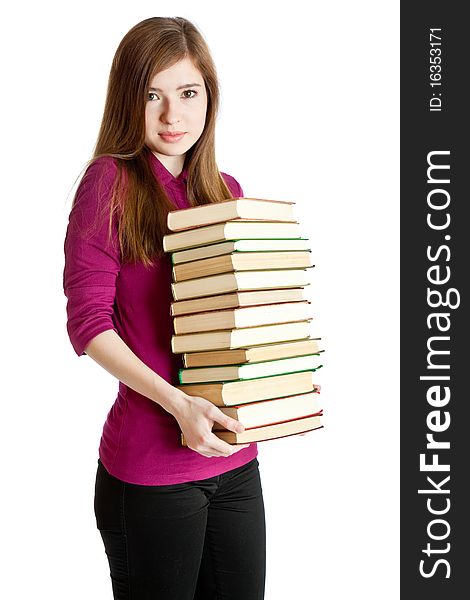 Young girl with pilе of books in hands