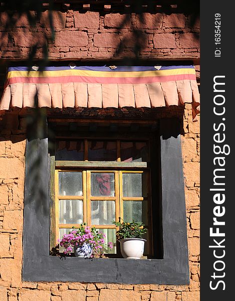 A window of typical Tibetan style in Lhasa,Tibet.Details. A window of typical Tibetan style in Lhasa,Tibet.Details.