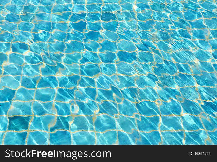 Waves on a surface of water in the pool