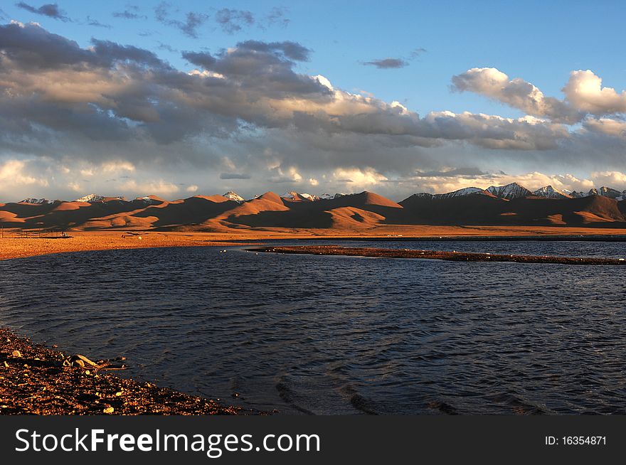 Scenery of lake and mountains at sunset in Tibet. Scenery of lake and mountains at sunset in Tibet.