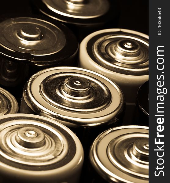 Closeup shot of batteries in sepia