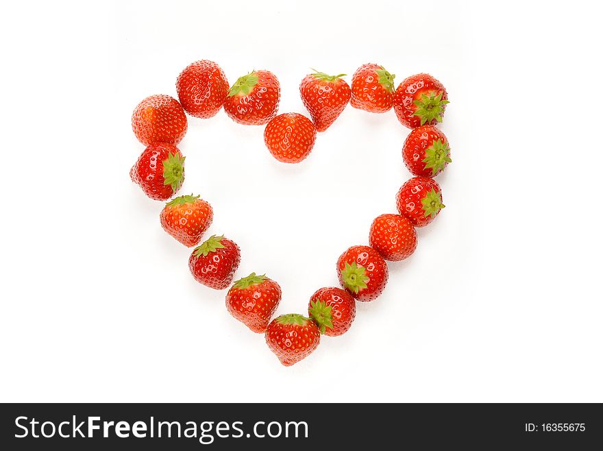 Strawberry fruits in form of heart. Strawberry fruits in form of heart