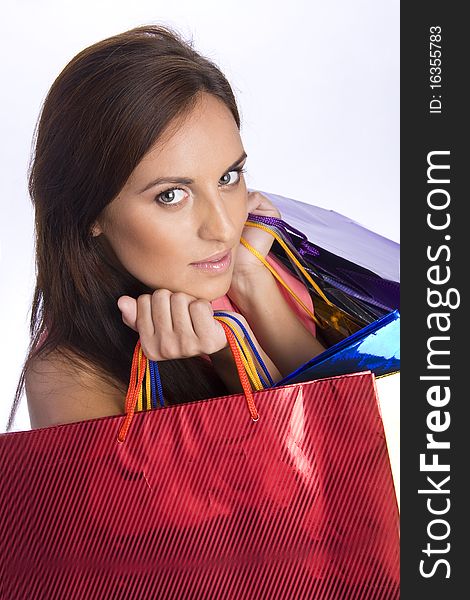 Pretty young woman with bags of purchases. Pretty young woman with bags of purchases