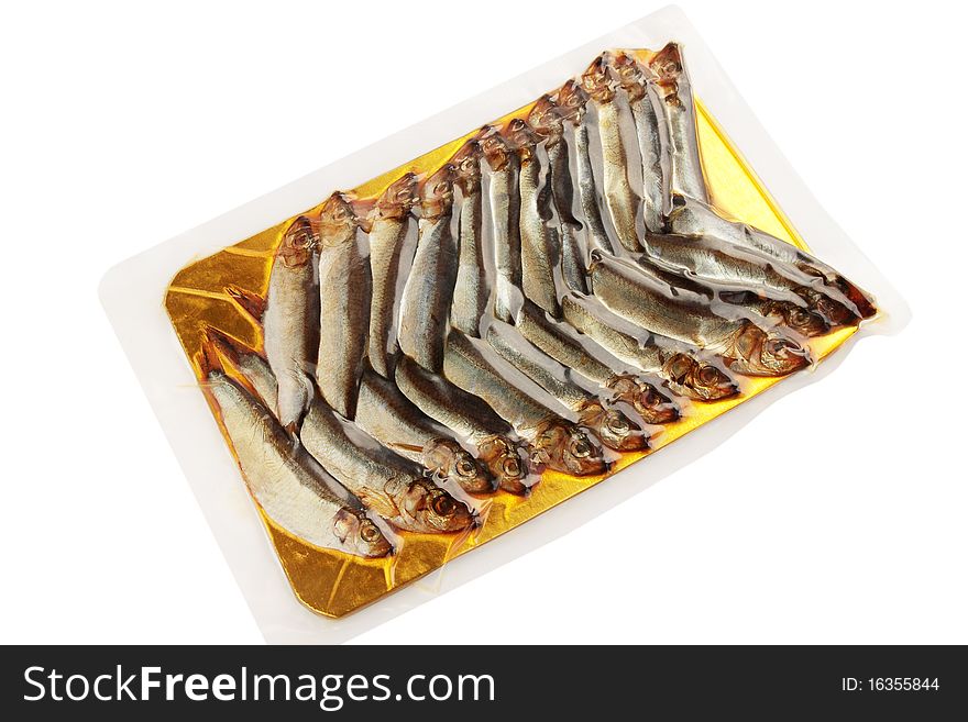 Smoked fish is sprat in the vacuum packing