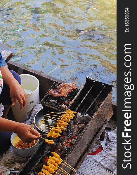 Cooking On Floating Market