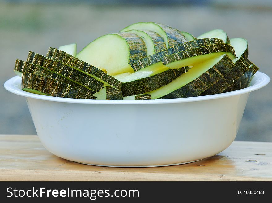 White dish filled with melons. White dish filled with melons