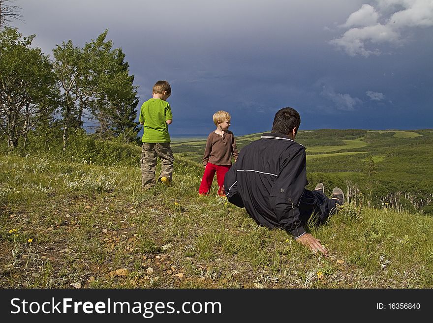 Family watches summer storm