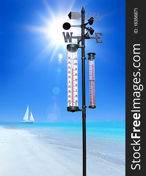 Sandy beach at sumer sunny day and thermometer