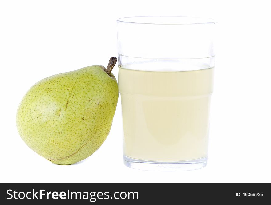 Pear with tumbler of fruit juice white background with room for copy space. Pear with tumbler of fruit juice white background with room for copy space
