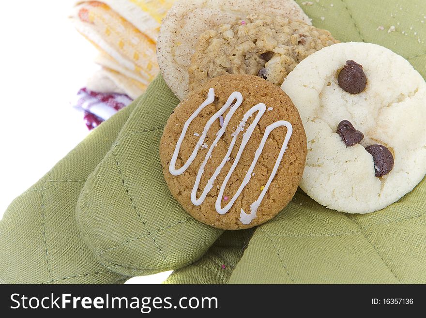 Homemade cookies on cooking mitts