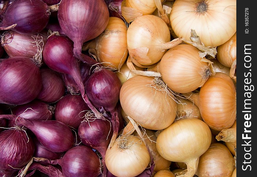 Red and white onions background