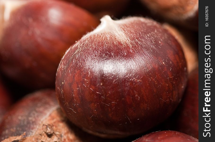 Raw chestnuts in a bowl.