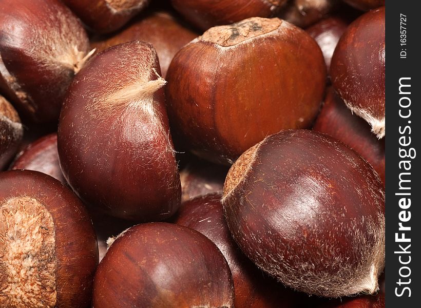 Raw chestnuts in a bowl.