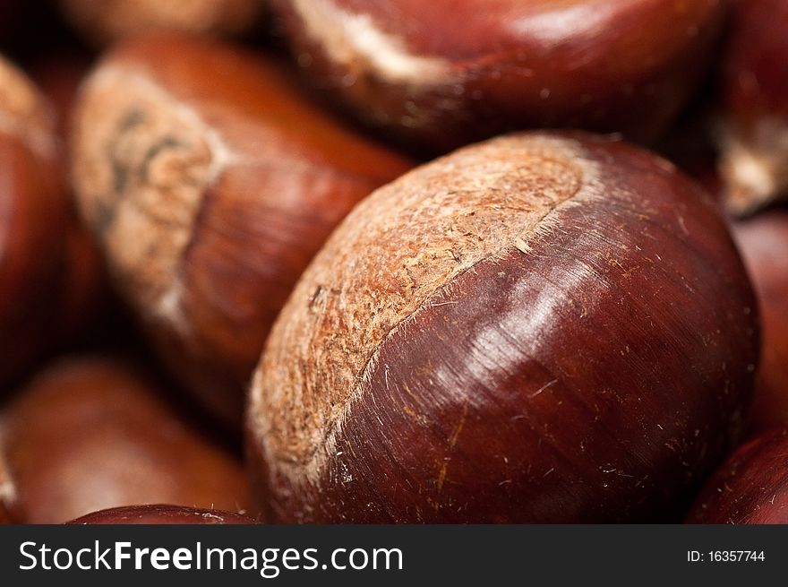 Raw chestnuts in a bowl.