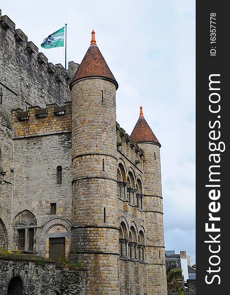 Old castle towers with flag